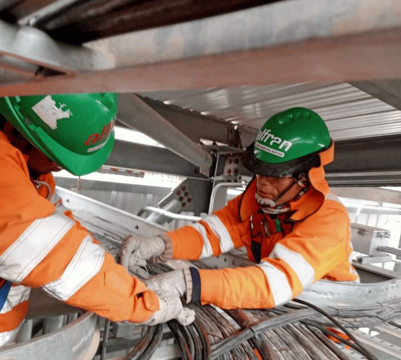Alfran technicians installing electrical tracing cable system